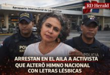 Arrestan en el AILA a activista acusada de alterar el Himno Nacional con letras lésbicas